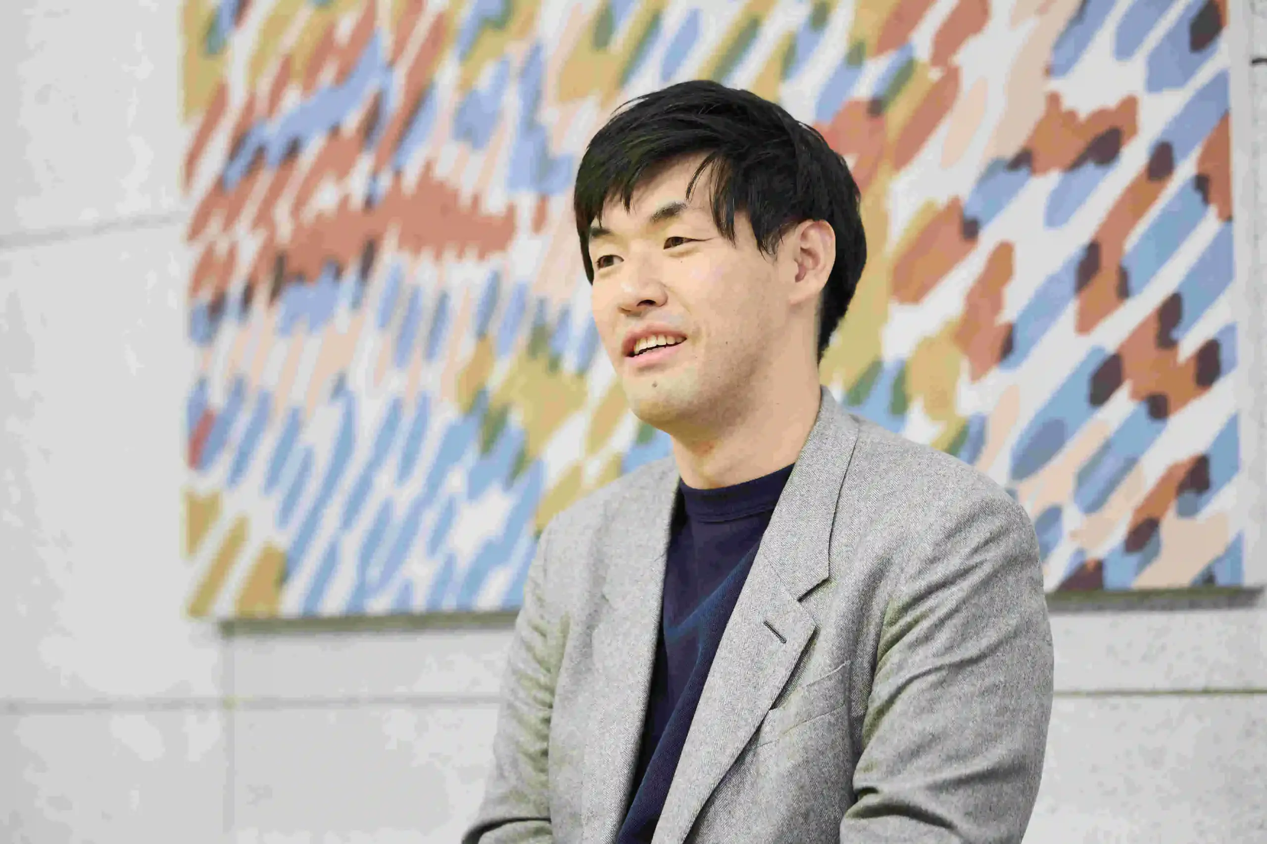 WeWorkのミーティングルームにて。株式会社ナシオ 代表取締役社長　平 元彦氏。